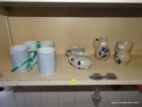 (KITCHEN) SHELF LOT OF POTTERY DISHES AND COFFEE MUGS; 8 PIECE LOT TO INCLUDE A SET OF 4 PIER 1 BLUE