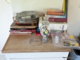 (KITCHEN) LOT OF ASSORTED COOKBOOKS AND KITCHEN ITEMS; COUNTER LOT TO INCLUDE 4 HEART SHAPED CAKE