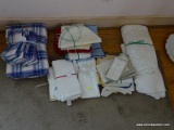 (BDRM) LOT OF ASSORTED TABLE CLOTHS AND PLACE MATS; LOT TO INCLUDE A SET OF 3 ROUND TABLE CLOTHS AND