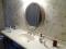 (BATHRM) CONTENTS OF BATHROOM; ITEMS INCLUDE- OVAL BEVELED GLASS MIRROR GOLD FRAME- 27 IN X 32 IN,
