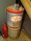 (BASE) GAS CANS WITH KEROSENE; 2 VINTAGE METAL 5 GAL GAS CANS FULL OF KEROSENE AND A FIRE