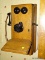 (KIT) ANTIQUE TELEPHONE; ANTIQUE OAK WALL PHONE HAS ALL THE WORKING PARTS WITH RINGER- 11 IN X 12 IN