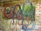 (UNDER PORCH) LOT OF GARDEN HOSES; 4 GARDEN HOSES