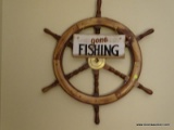 (FAMRM) SHIPS WHEEL; WALNUT AND BRASS SHIP'S WHEEL- 29 IN DIA. AND A GONE FISHING WOODEN PLAQUE- 12