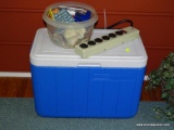 (PORCH) MISC.. LOT; LOT INCLUDES COLEMAN COOLER, CONTAINER OF FRIG MAGNETS AND A SURGE PROTECTOR
