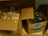 (BASE) CANNING JARS; 2 BOXES OF CANNING JARS SOME WITH GLASS AND WIRE LOCK LIDS BY ATLAS