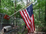 (BYD) FLAG LOT; 3 FLAGS AROUND YARD- 2 US FLAGS ON POLES AND A DON'T TREAD ON ME FLAG ON POLE