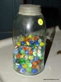 (KIT) JAR WITH MARBLES; ANTIQUE MASON'S 1850 BALL JAR HALF FULL OF VINTAGE MARBLES