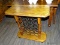 (R3) WINE CART; OAK WINE CART WITH 24 IRON WINE BOTTLE SLOTS AND CASTERS. MEASURES 30