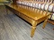 (R3) CHERRY FINISHED COFFEE TABLE; RECTANGULAR COFFEE TABLE WITH DETAILED TAPERED BLOCK LEGS.