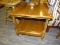 (R3) CHERRY FINISHED SIDE TABLE; SINGLE DRAWER COFFEE TABLE WITH A LOWER SHELF AND LEAF DETAILING ON