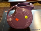 (R2) VINTAGE FIESTAWARE PITCHER - LILAC PURPLE. MARKED ON BOTTOM WITH LOWERCASE F. MEASURES 7.5