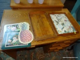 (R2) LOT OF TRAYS, CHOPPING BOARD, AND 2 TRIVETS; 5 PIECE LOT TO INCLUDE FLORAL PRINT TRAY WITH