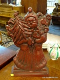 (R3) VIRGINIA METALCRAFTERS SANTA DOOR STOP; RED PAINTED IRON, SANTA HOLDING PRESENTS AND TREE, DOOR
