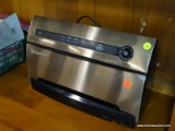 (R4) FOODSAVER VACUUM SEALER WITH SMARTSEAL TECHNOLOGY. MODEL NO. V3840. COMES OUT OF BOX.
