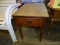(R5) YOUNG REPUBLIC SIDE TABLE; MAPLE, SINGLE DRAWER SIDE TABLE WITH A BRACKET CORNER SKIRT AND