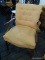 (R6) UPHOLSTERED ARM CHAIR; WALNUT ARMCHAIR WITH SCROLLING FLORAL CARVED ARMS, CARVED LEGS, AN H