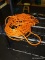(R6) EXTENSION CORD; 50-100 FT ORANGE EXTENSION CORD.