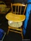 (R7) VINTAGE WOODEN HIGH CHAIR WITH REMOVABLE TRAY AND SEAT COVER. SHOWS SIGNS OF WEAR. MEASURES 17