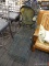 (R7) WROUGHT IRON ROCKING PATIO CHAIR; GREEN CHAISE STYLE PATIO CHAIR ON ROCKING BASE. HAS VERY