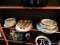(SHELVES) LOT OF ASSORTED PLATES; 24 PIECE LOT OF ASSORTED PLATES TO INCLUDE 7 GIBSON SAUCERS, 4