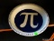 (SHELVES) PI DISH PIE PLATE WITH THE NUMBERS OF PI AROUND THE RIM.