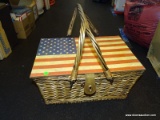 (R2) AMERICAN FLAG PICNIC BASKET WITH DISHES; WICKER PICNIC BASKET WITH AMERICAN FLAG PAINTED