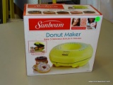 (R2) SUNBEAM DONUT MAKER. BAKES 5 DELICIOUS DONUTS IN MINUTES.