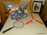 (R3) BAG LOT OF TOYS; BAG CONTAINS ASSORTED RC CARS, A BADMINTON RACKET, A TOY HELICOPTER, ETC.