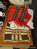 (R3) ET OF ASSORTED LINENS; LOT INCLUDES 2 SOFT RED PLAID SCARVES, A BEIGE KNIT THROW, AND A BROWN