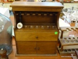 (R3) DECATUR GENUINE WALNUT PIPE STAND CABINET WITH 7 SLOTS, A DRAWER, AND A BOTTOM CABINET.