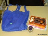 (R3) FABRIC BAG WITH CONTENTS; BLUE FABRIC BAG WITH A CANDLE STICK AND BOOKS TO INCLUDE 