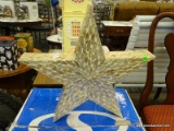 (R3) TAN COLORED COMPOSITE STAR WITH REFLECTIVE TILES. MEASURES 21