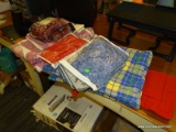(R3) LOT OF ASSORTED LINENS; INCLUDES A SET OF 4 PLACEMATS, A PAIR OF PILLOW SHAMS, A RED PILLOW