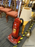 (R3) DIRT DEVIL SWIVEL GLIDE UPRIGHT VACUUM WITH 7 FLOOR SETTINGS, A 12 AMP MOTOR, AND A SCUFF