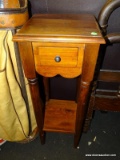(R5) TELEPHONE TABLE; STAINED TELEPHONE TABLE WITH A SINGLE DRAWER, TAPERED POLE LEGS, AND A LOWER