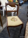 (R5) VICTORIAN SIDE CHAIR; DARK FINISHED WOOD, VICTORIAN SIDE CHAIR WITH A ROSE CARVED CROWN AND A