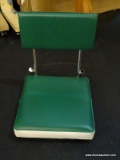 (R6) BLEACHER SEAT; GREEN AND WHITE, FOLDING CUSHIONED BLEACHER SEAT.