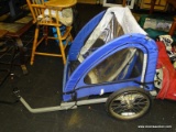 (R7) QUICK-N-EZ DOUBLE TOW BEHIND BIKE TRAILER; COMES WITH A BLUE AND CREAM COLORED 2-IN-1 CANOPY