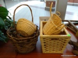 LOT OF WICKER BASKETS; 5 PIECE LOT TO INCLUDE A SMALL ROUND BASKET, A SLEIGH SHAPED BASKET, A LARGER
