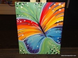 (TABLES) BUTTERFLY OIL ON CANVAS; DEPICTS A BLUE AND ORANGE BUTTERFLY WITH A GREEN BACKGROUND.