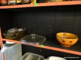 (SHELVES) SHELF LOT; 4 PIECE LOT TO INCLUDE A YELLOW GLASS BOWL, A BASKETBALL BALL, AND A PLASTIC