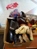 BOX LOT OF ASSORTED ITEMS; INCLUDES VHS TAPES, HATS, 2 TOILETRY SETS, A SET OF 2 PERFECT PUSH UP