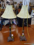 PAIR OF TABLE LAMPS; 2 PIECE SET OF COPPER TONED TABLE LAMPS WITH ORNATE CARVINGS AND A CREAM FAUX