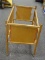 DOLL CRIB; VINTAGE, ROLLING DOLL CRIB WITH WOODEN CASTERS. MISSING BOTTOM.
