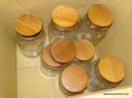 SET OF ANCHOR HOCKING JARS; 7 PIECE LOT OF WOODEN LID JARS. INCLUDES A SPARE LID.