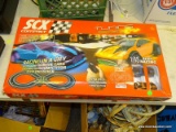 SCX COMPACT TUNING SERIES SLOT CAR RACING SET INCLUDES 2 CARS AND TRACKS. 1:43 SCALE.