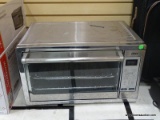 OSTER TOASTER OVEN WITH TURBO CONVECTION. MODEL NO. TSSTTVXLDG-002.