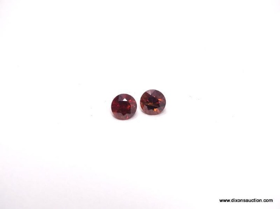 [2] 3.85MM ROUND GARNETS. 1.5 TOTAL CARATS.