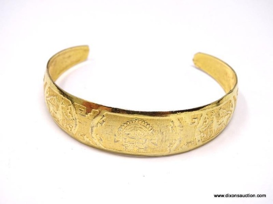 AWESOME INCA GOLD TONE PERUVIAN BRACELET. HAND CRAFTED IN PERU, THIS EMBOSSED BRACELET DEPICTS A